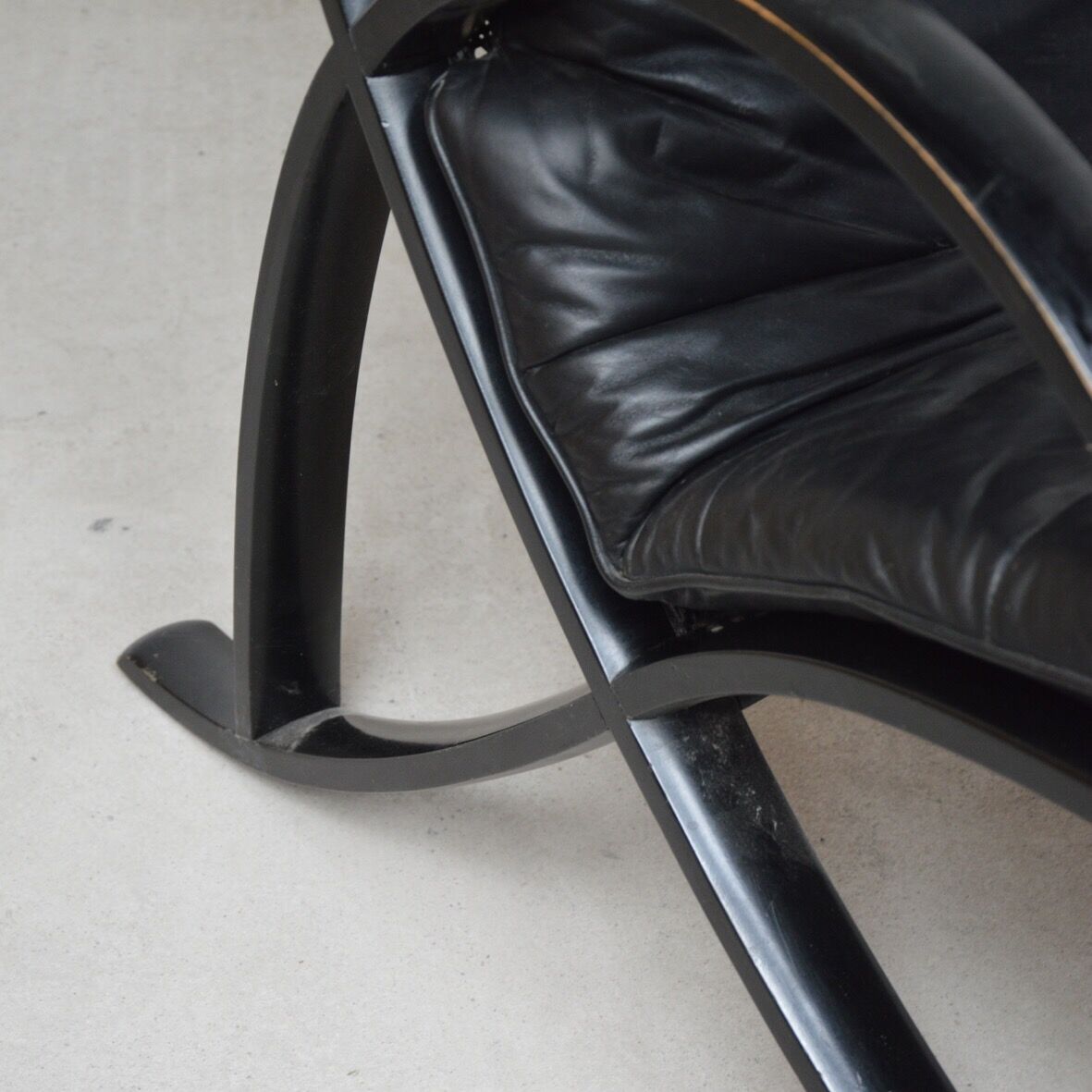 Black leather armchair and canning