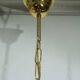 4-light glass and brass chandelier