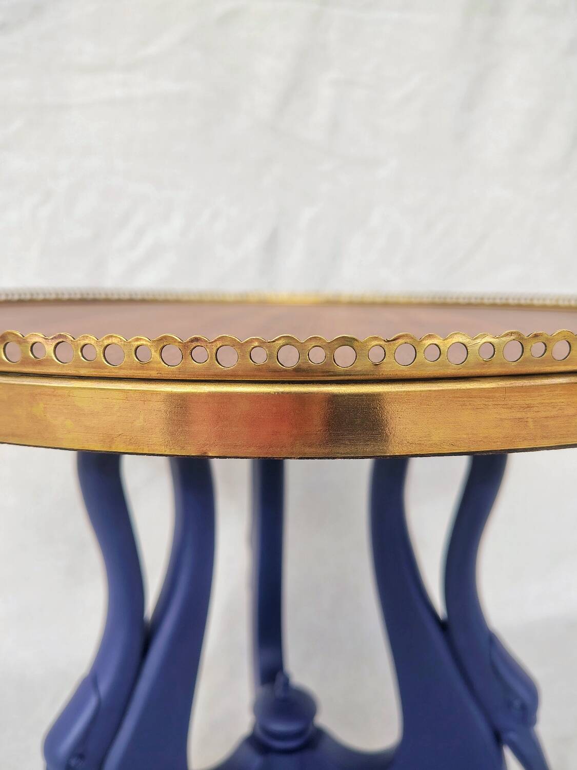 Side table with swan legs