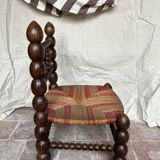 Turned wooden chair by Charles Dudouyt