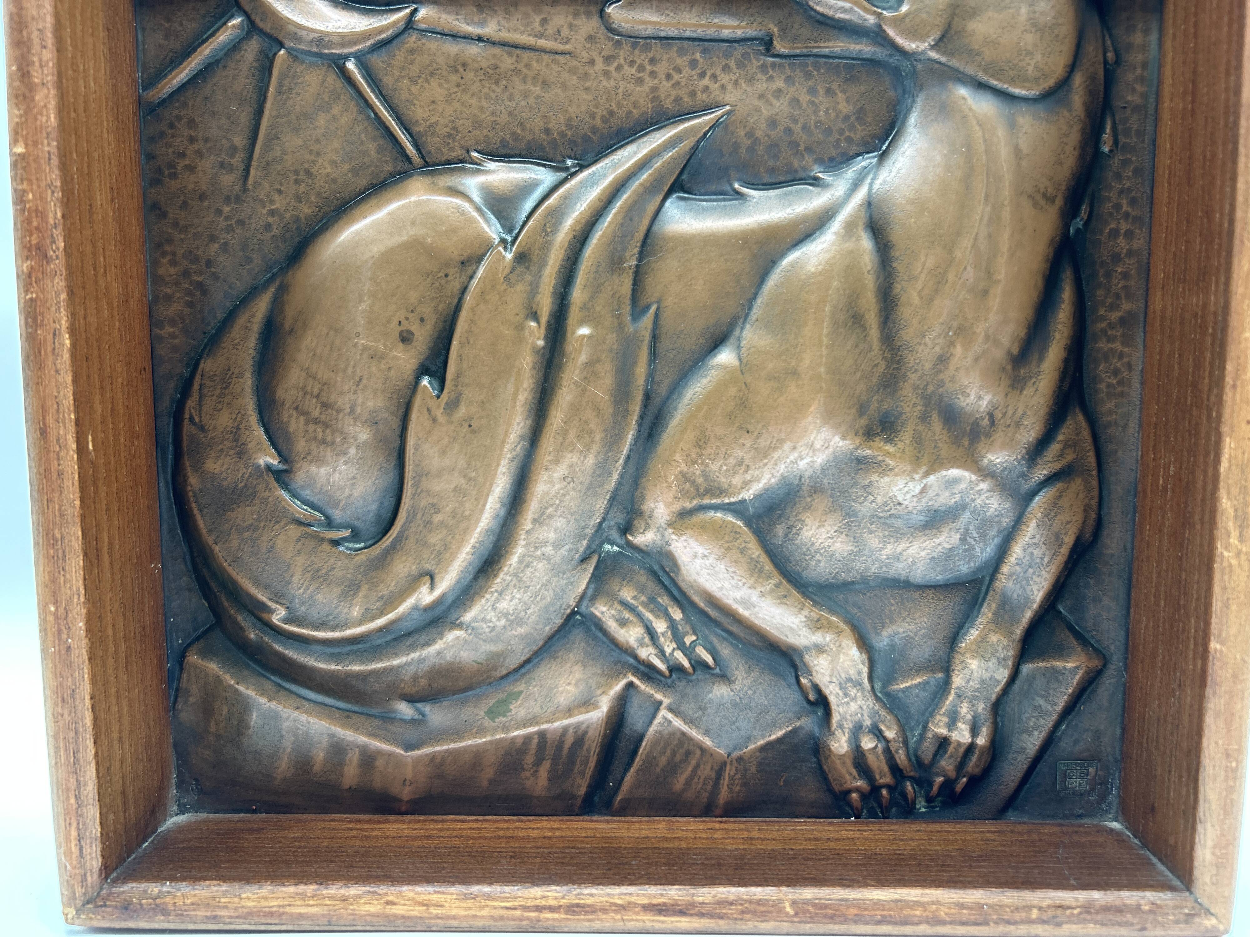 Art deco bas-relief in maredsous brasswork.