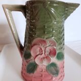 Slush pitcher. Pansy pattern on wicker basket background. Green and pink.