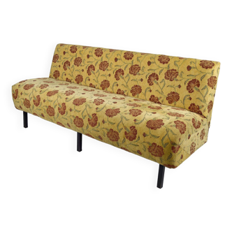 Bench with yellow and red floral fabric, France, circa 1960