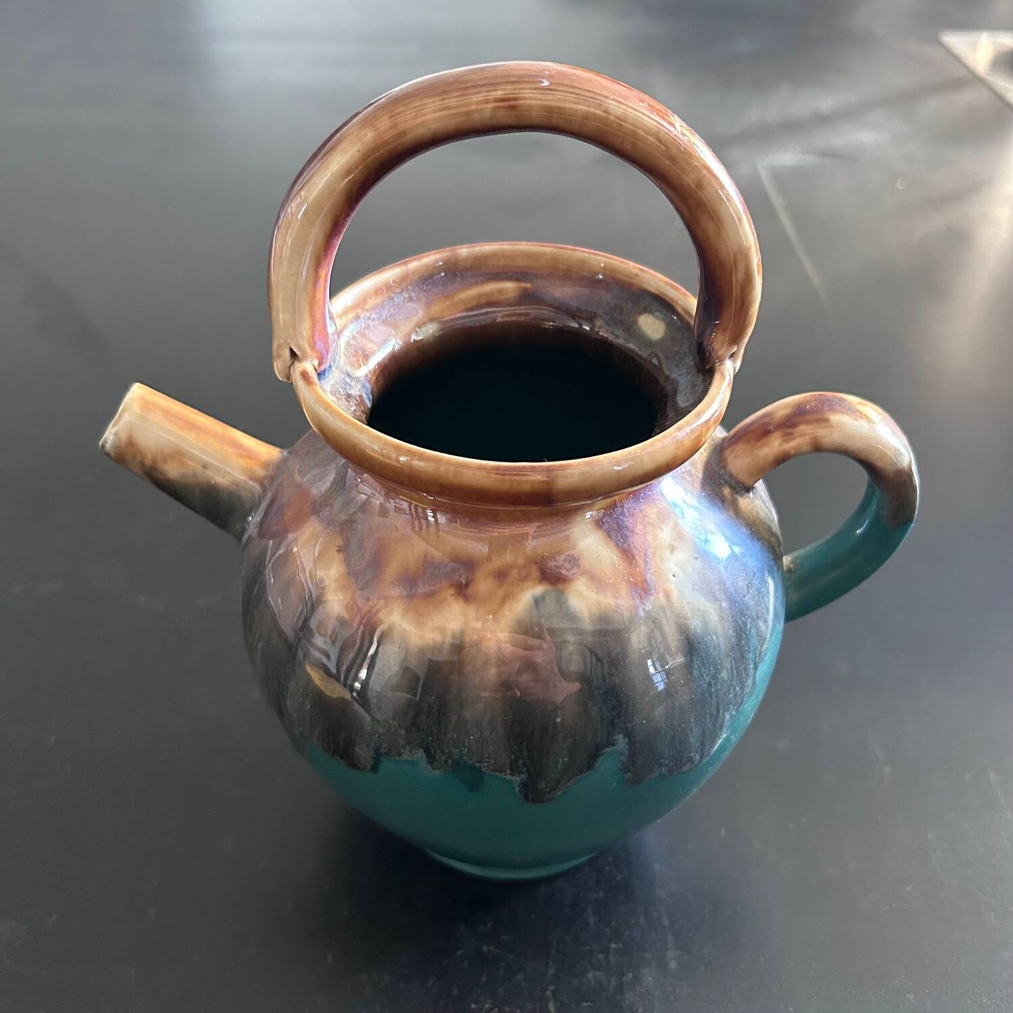 Green and ochre flamed goat