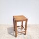 Tabouret ancien en bois foncé patiné