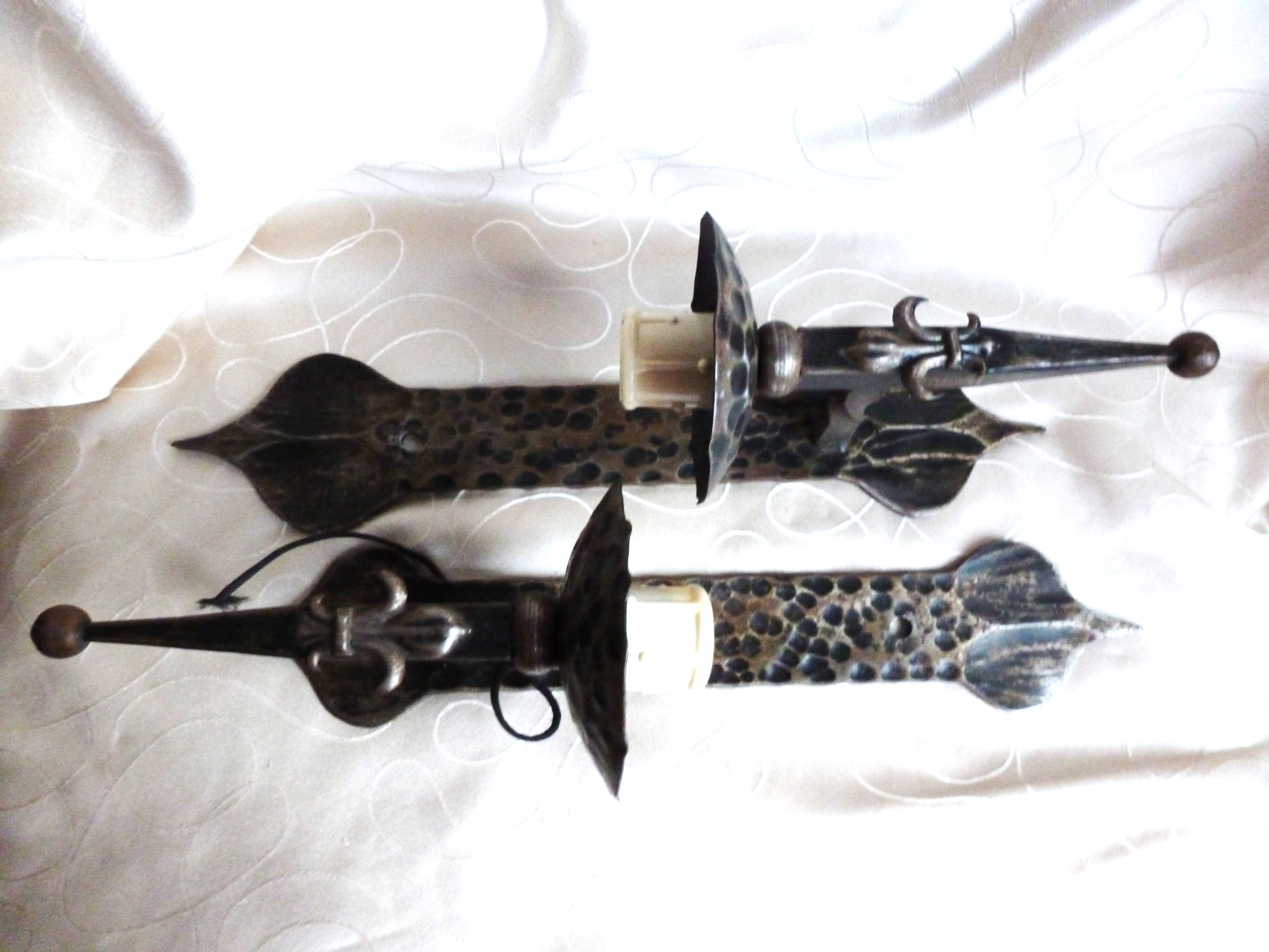 Medieval wrought iron wall lights / antique medieval lighting.