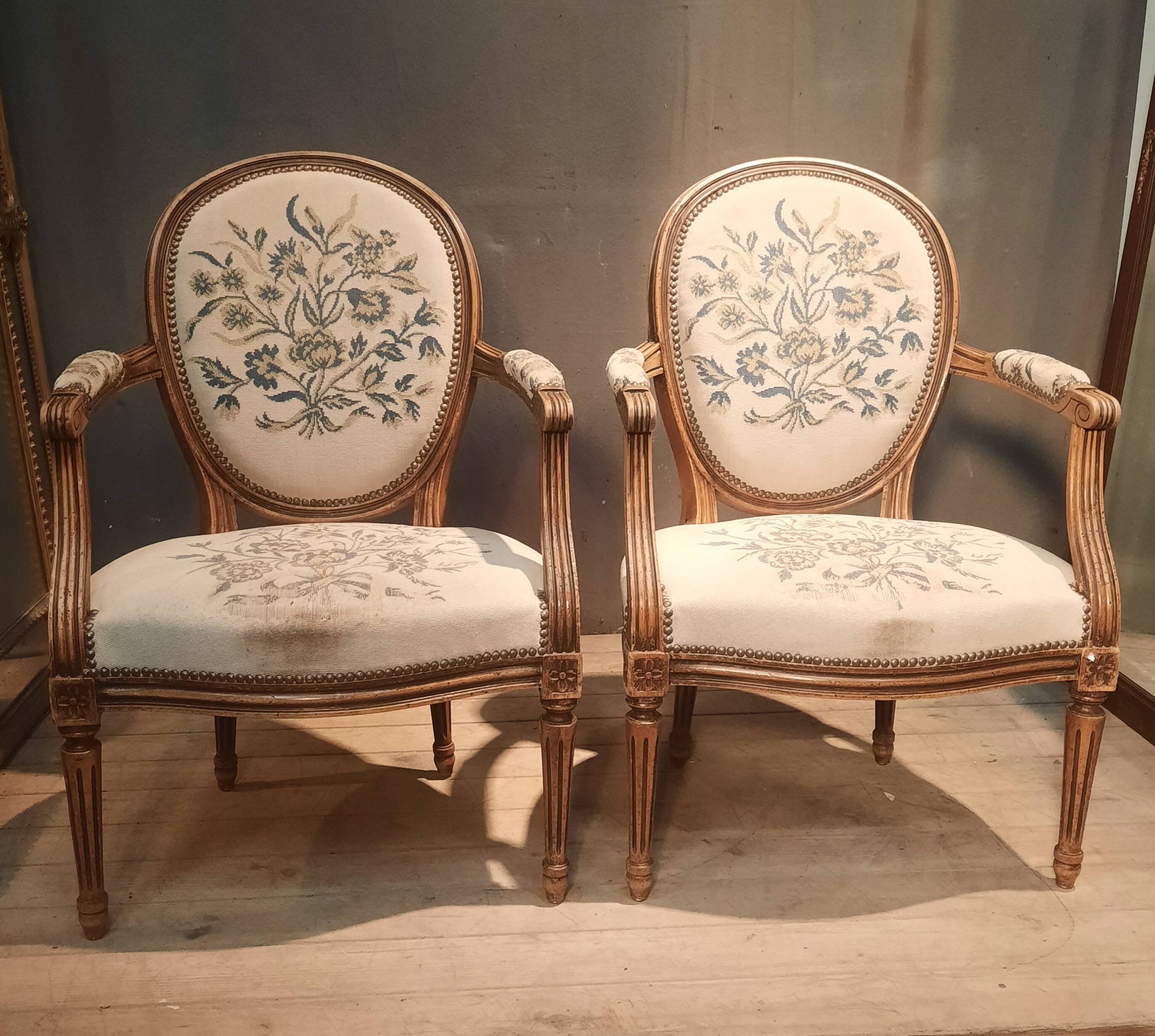 Pair of Louis XV style medallion armchairs.