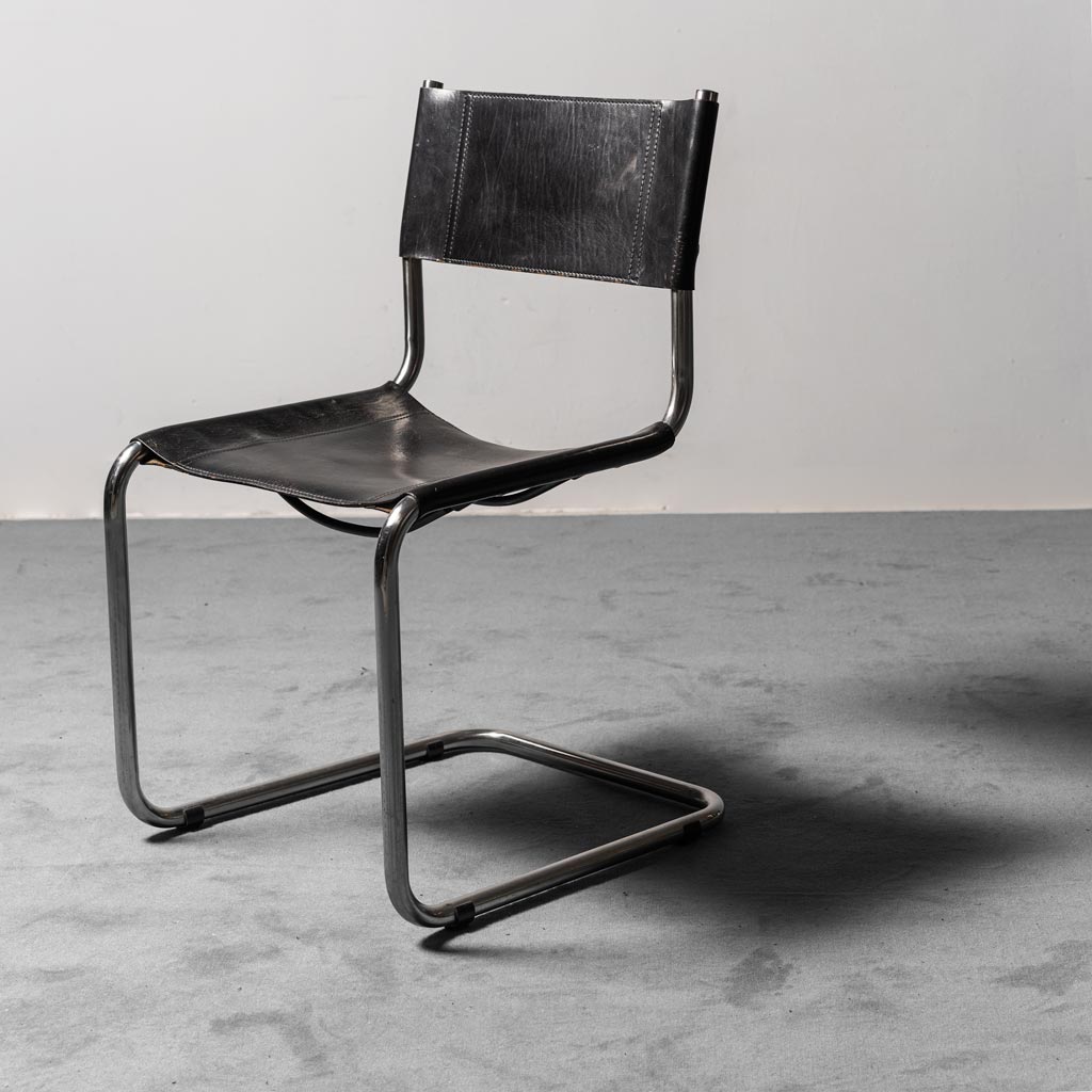 Set of 4 chairs in black leather 70s vintage