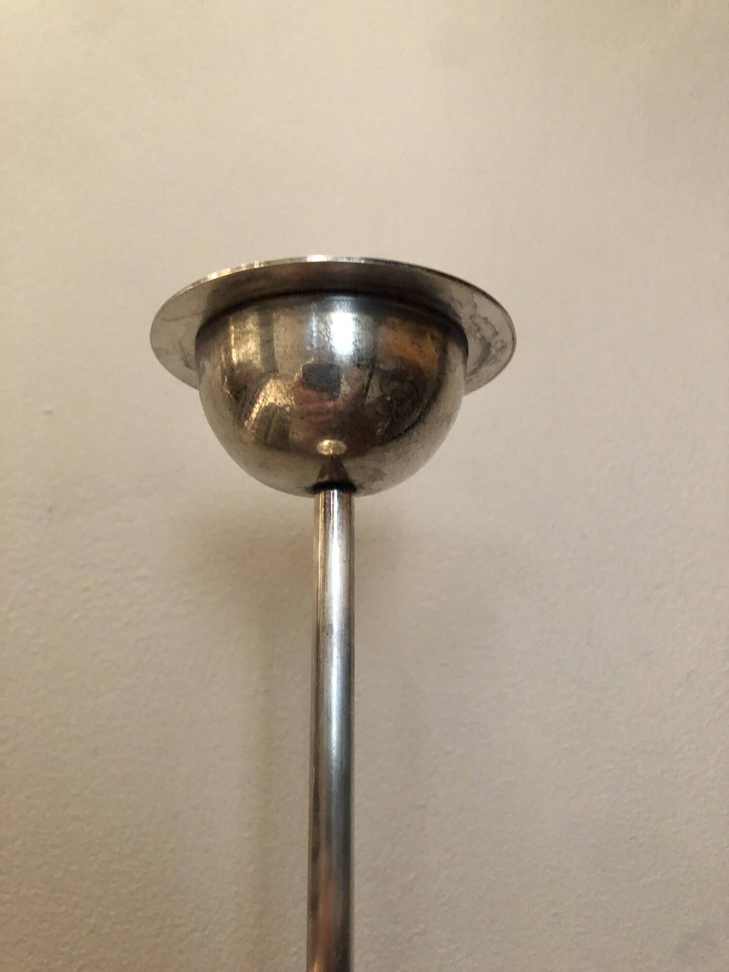 Silver-plated metal candlestick in vintage Art Deco style