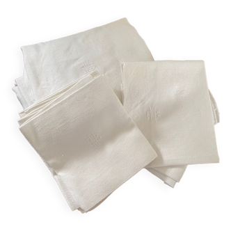 Nappe et 12 serviettes en coton blanc damassé début XXe.