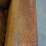 Patinated sheep leather wingback armchair