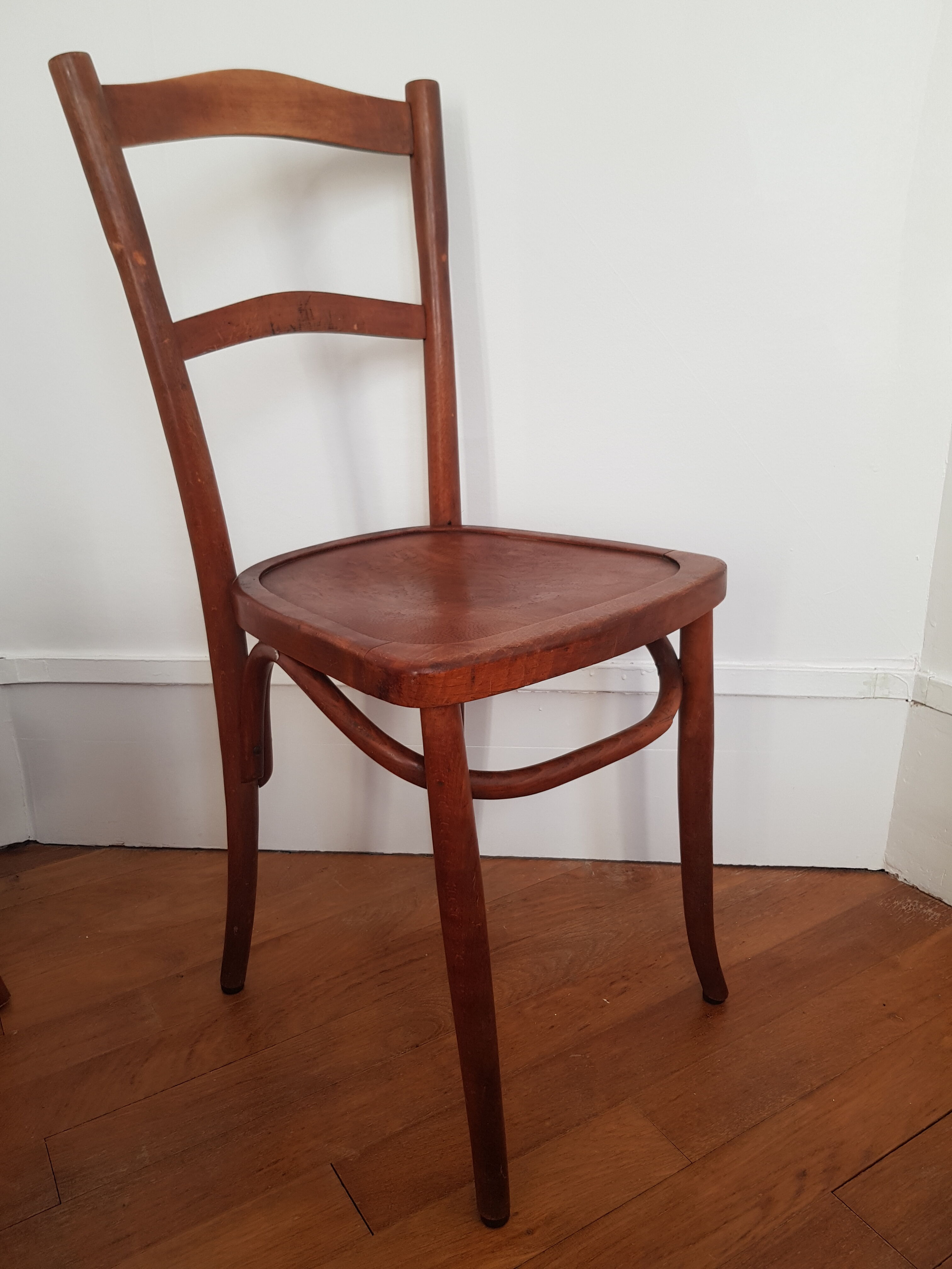 Curved wooden bistro chair