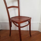 Curved wooden bistro chair