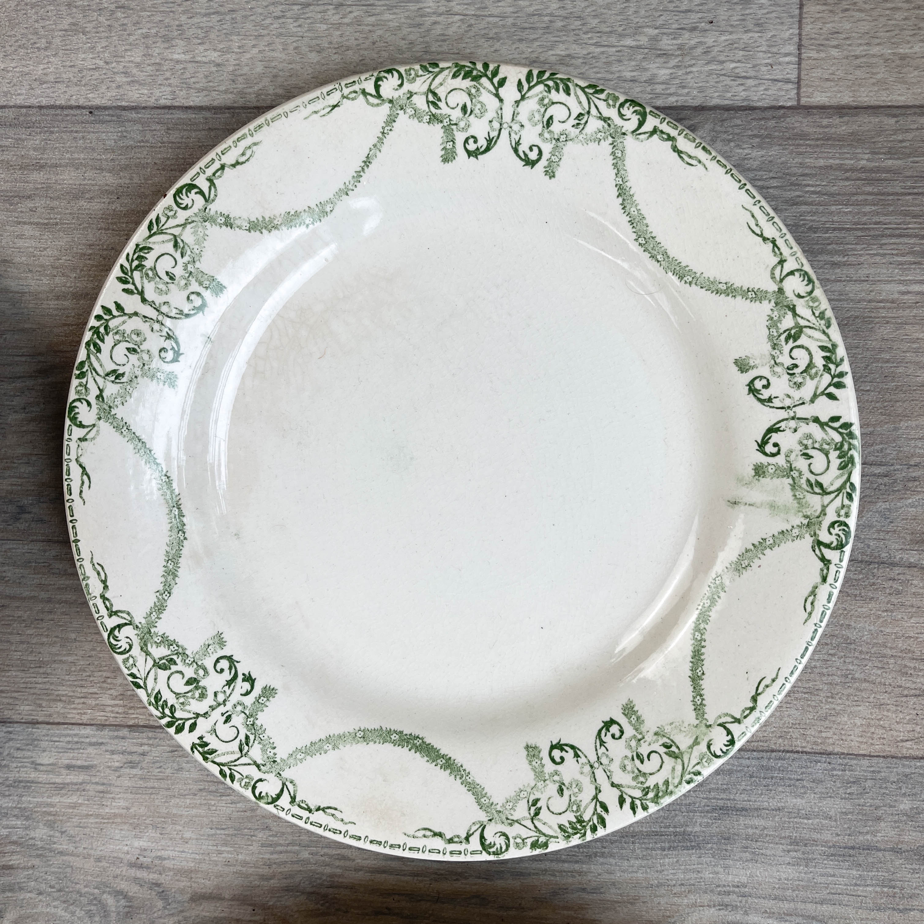 6 green and blue mismatched iron earth plates