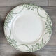 6 green and blue mismatched iron earth plates