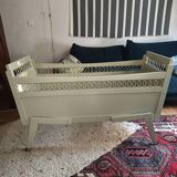 Vintage cot in wood and rattan