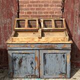 Showcase for boutique furniture, inclined boxes for presentation of collections on low sideboard