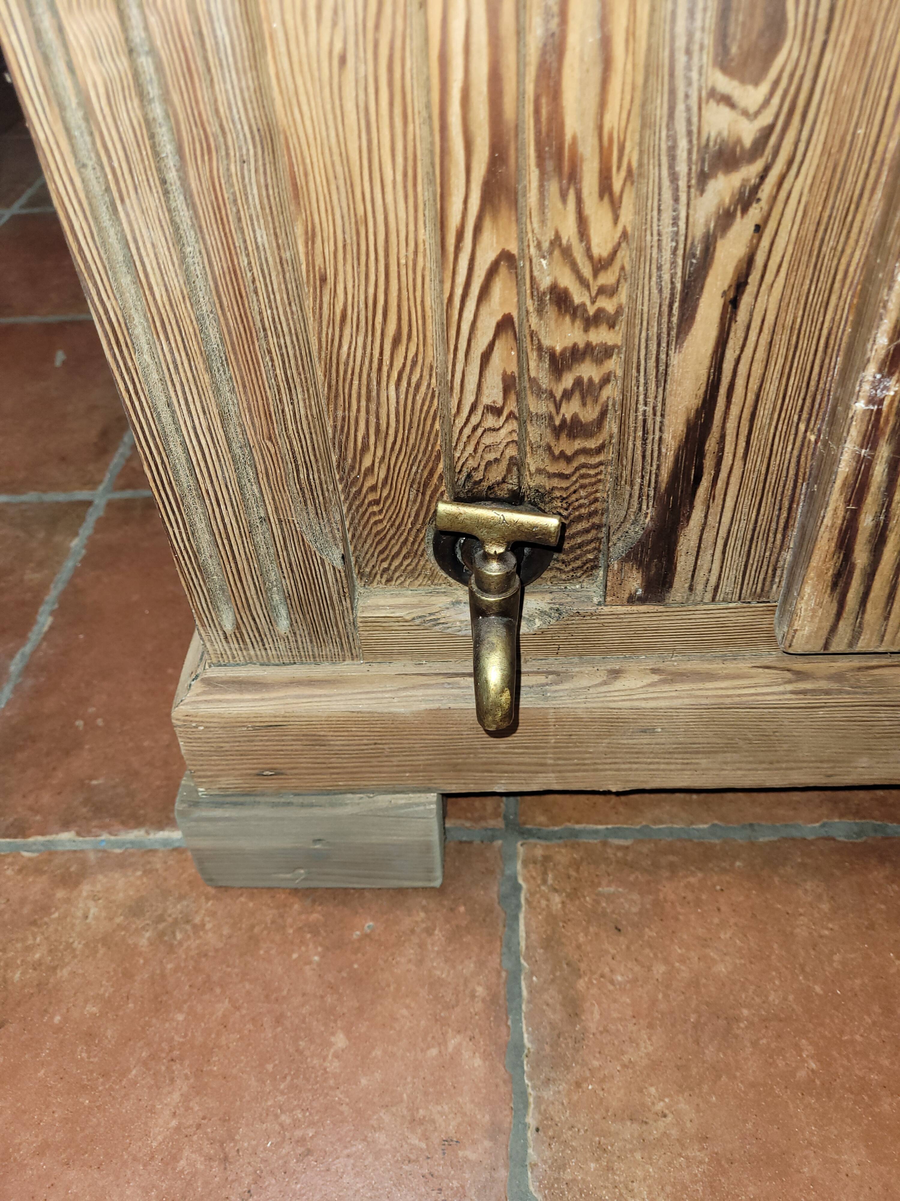 Antique cooler with a door