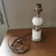 Vintage lamp base in wood and gold metal