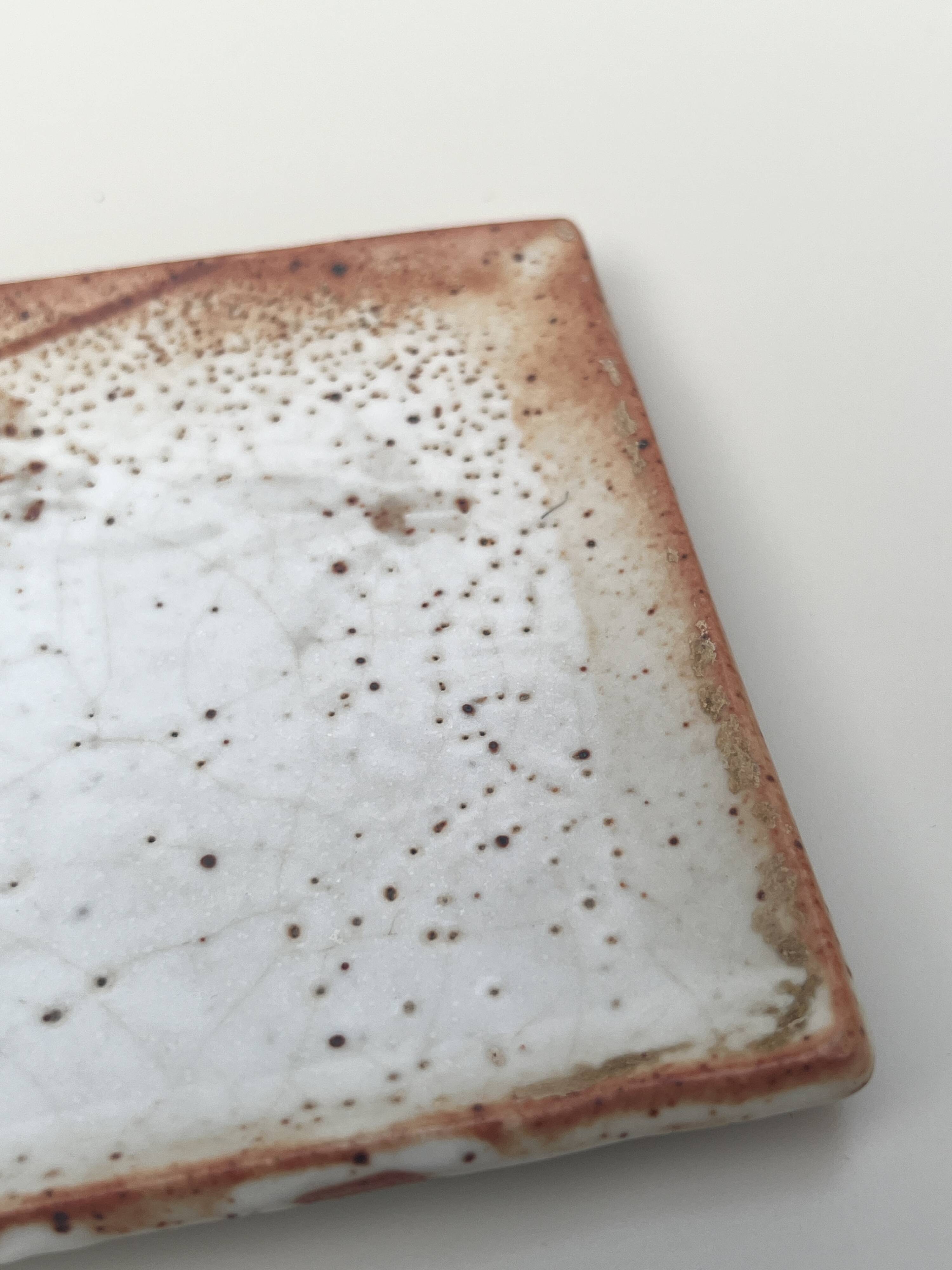 Empty pocket plate in Japanese stoneware.