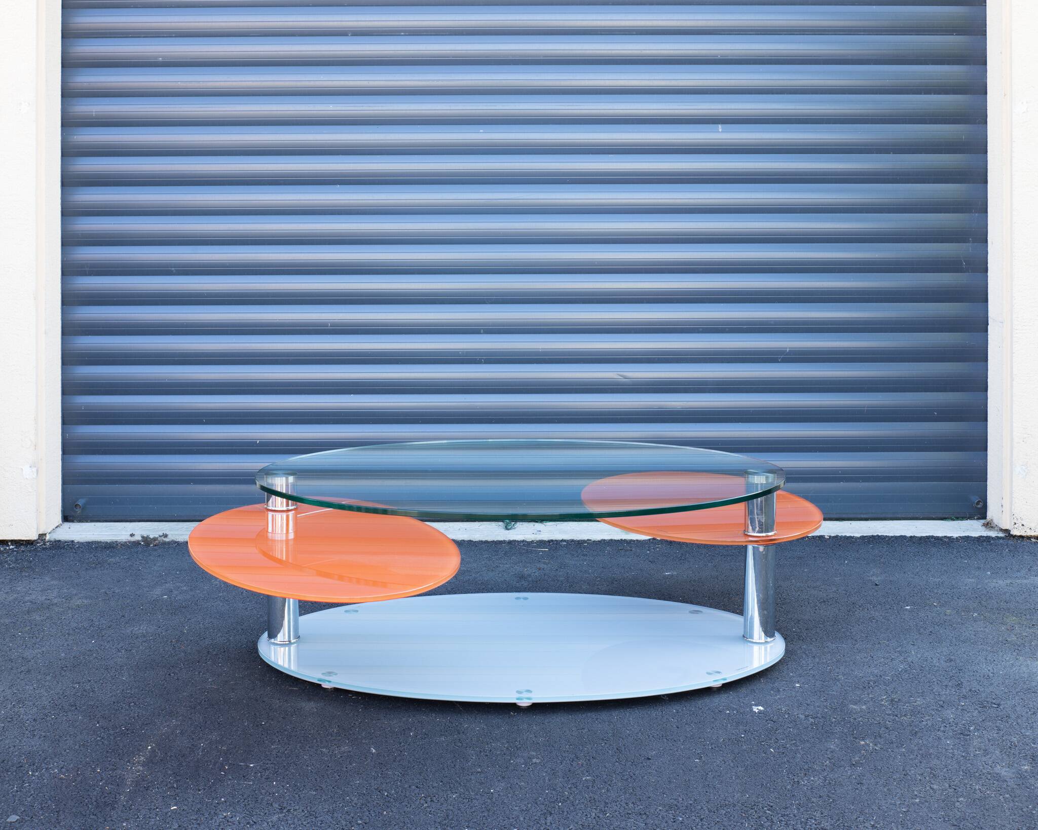 Antoine Motard designer swivel tempered glass coffee table
