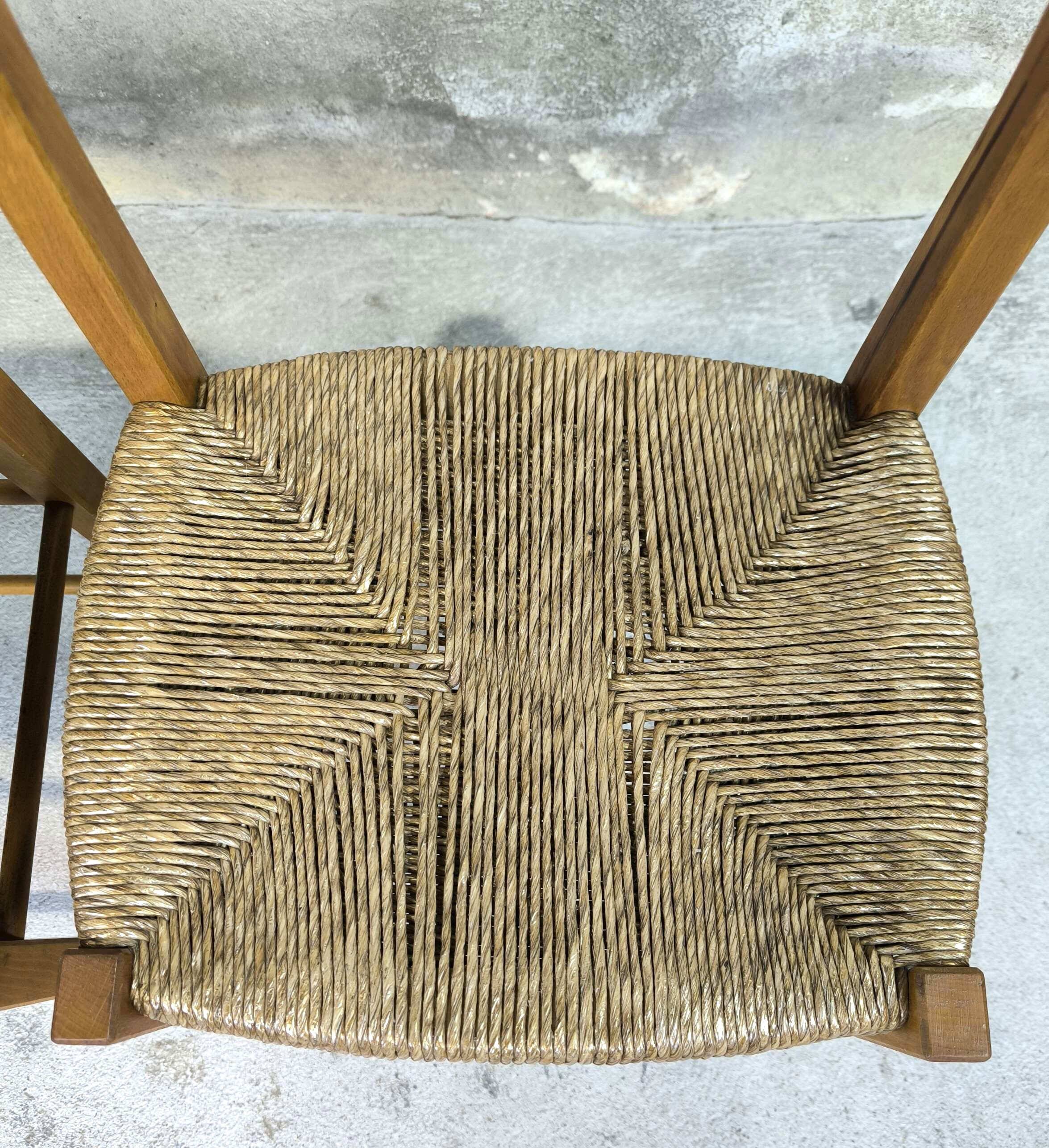 Pair of vintage wood and straw chairs