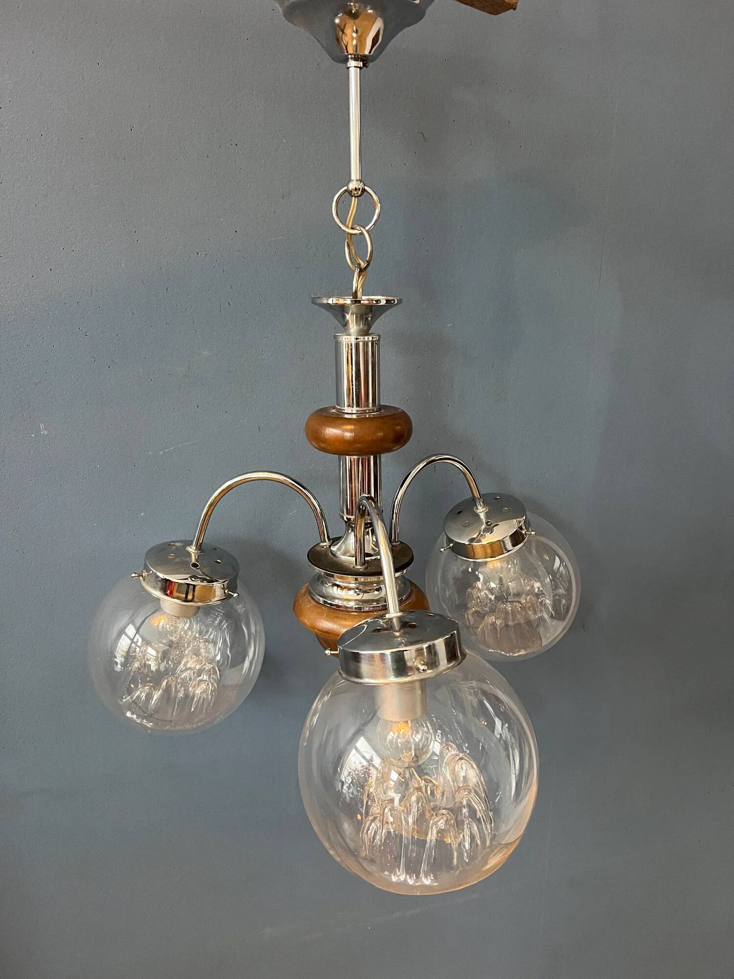 Vintage clear glass Murano chandelier with chrome frame