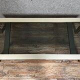 Design coffee table in gilded metal and tinted glass