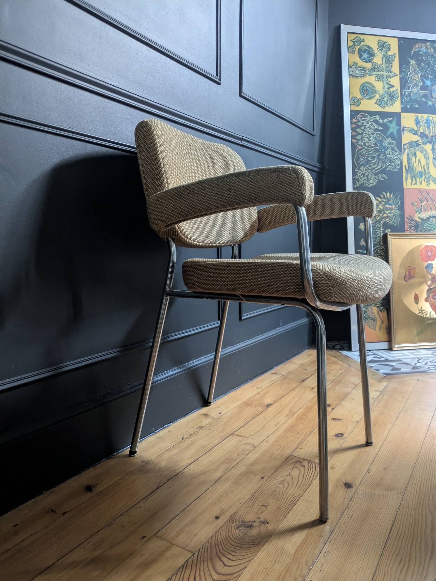 vintage tubular metal chrome office chair with patterned fabric.
