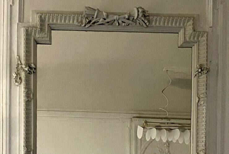 Louis XVI style mirror in wood and carved stucco 20th century