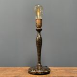 Black table lamp with paint splatters from the 1920s