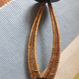 Iron and rattan candle holder