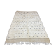 White wool mat with stitches