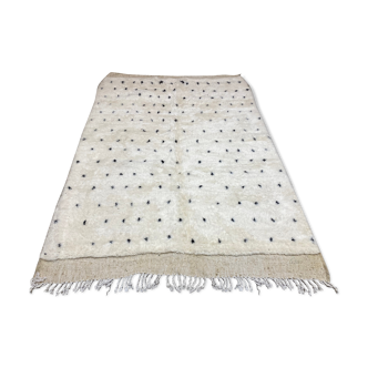 White wool mat with stitches