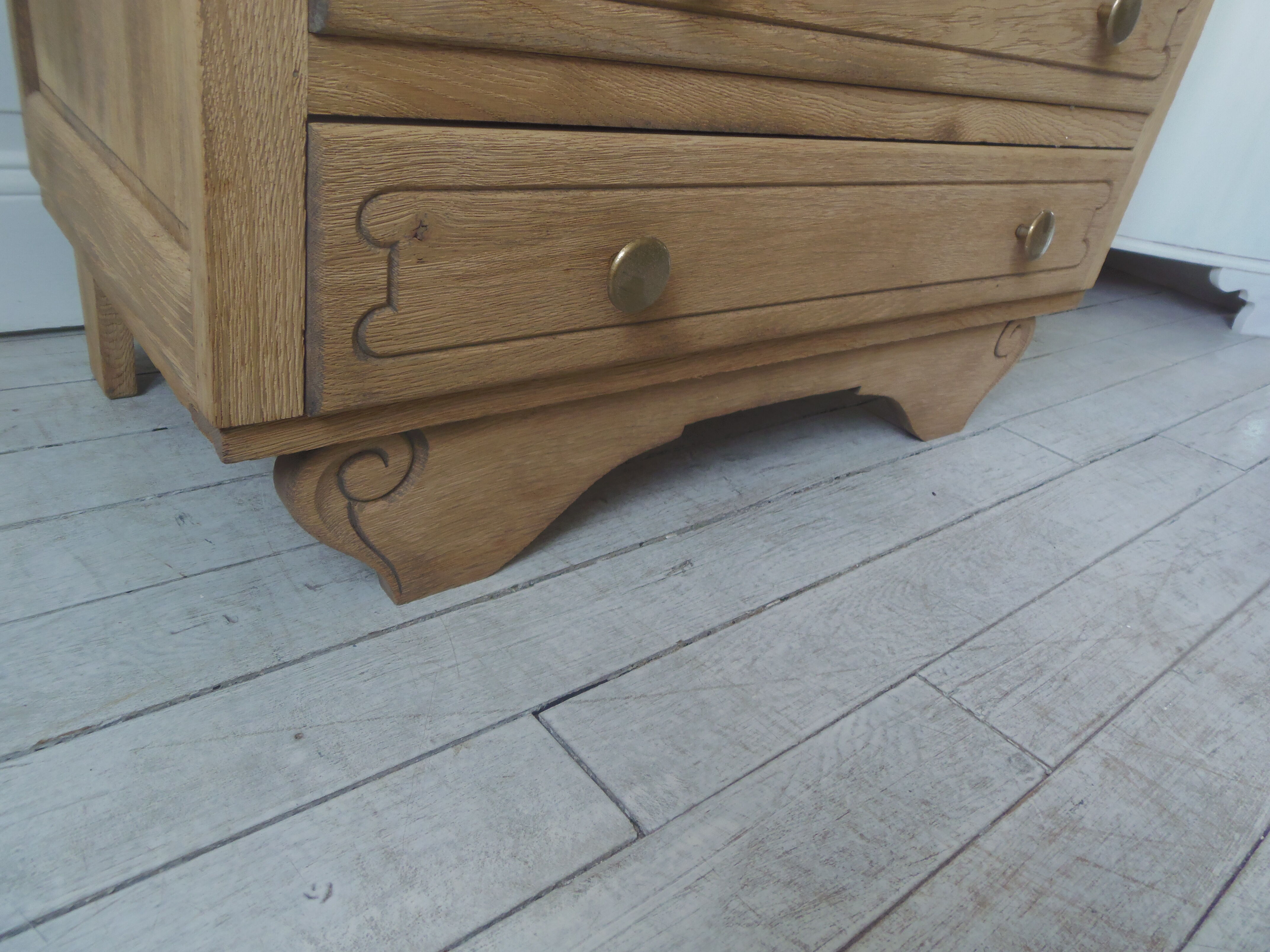 Vintage oak chest of drawers, a travertine plate laid for tray.