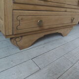 Vintage oak chest of drawers, a travertine plate laid for tray.