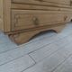 Vintage oak chest of drawers, a travertine plate laid for tray.