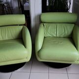 Pivitant leather armchairs