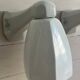 Pair of Art Deco wall sconces in ceramic and opaline.