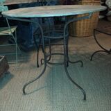 Wrought iron and zinc garden table