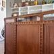 Counter, glass-fronted wooden workbench in dark wood, 8 drawers.