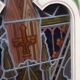Large solid wood frame composed of 5 stained glass niches