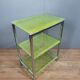 Shelf cabinet in broken tempered glass and metal