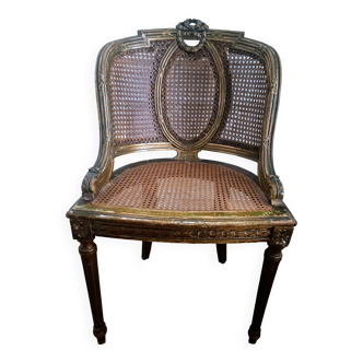 Fauteuil corbeille style Louis XVI canné - bois doré