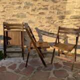 Three wooden folding chairs