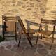 Three wooden folding chairs