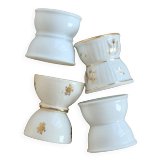 4 mismatched vintage diabolo egg cups in earthenware