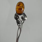 Silver spoon with amber