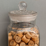 Old jar and tokens in turned wood