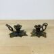 Pair of brass flower candlesticks, cellar